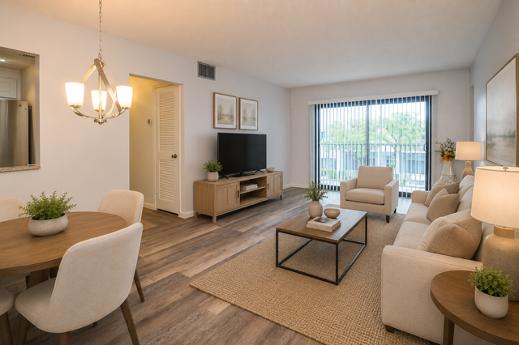 Living and dining area looking toward the balcony